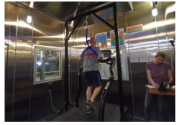 Photo taken in the environmental chamber, showing how participants will follow an exercise protocol that will stimulate core body temperature to rise. 