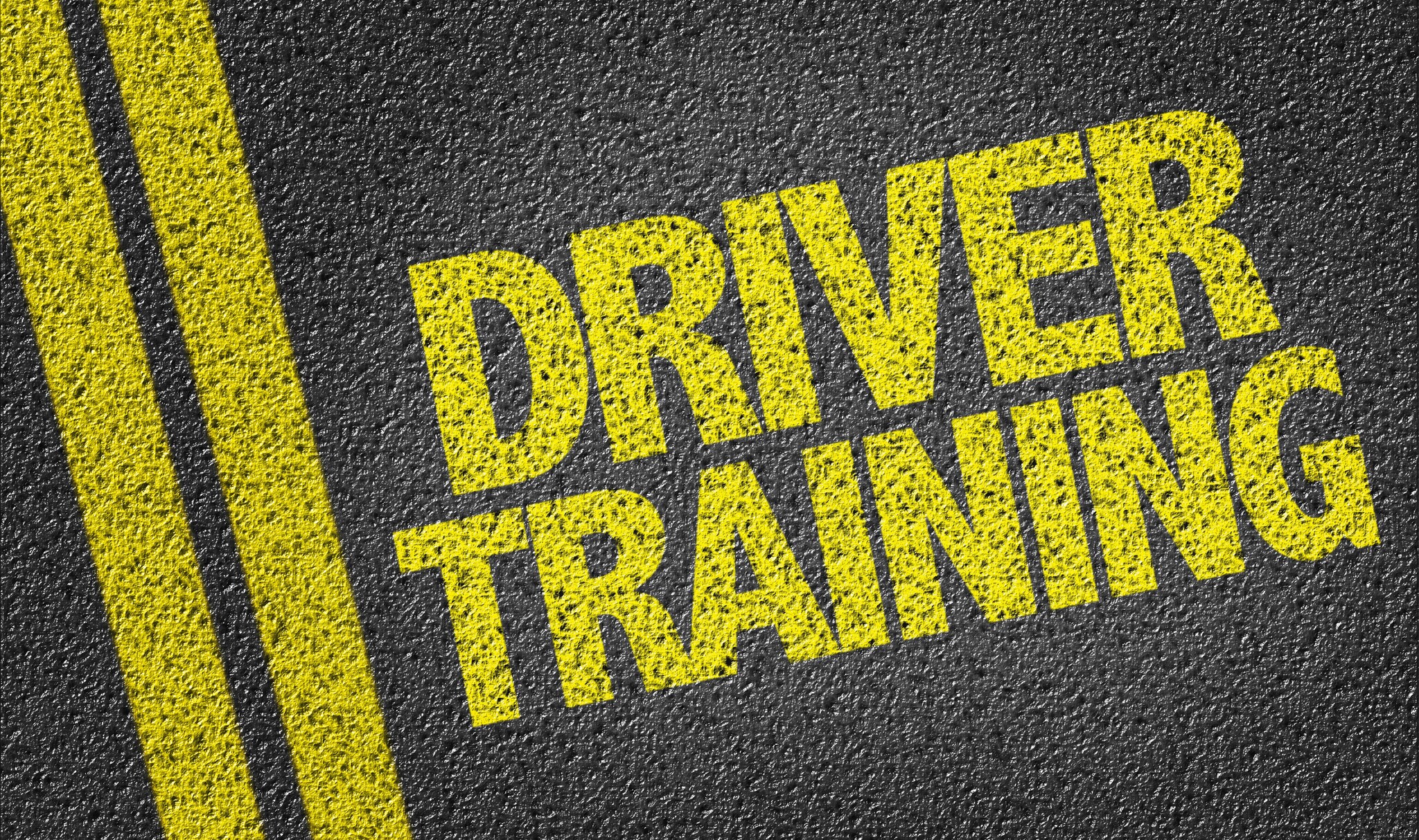 Driver Training painted on asphalt road