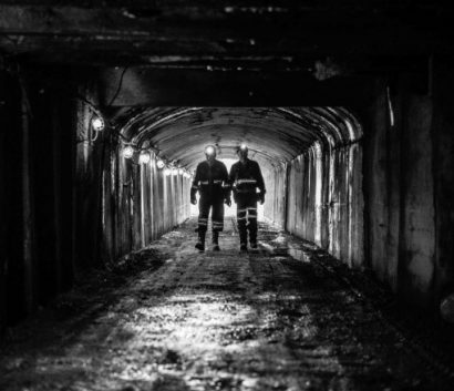 Miners walking in shaft