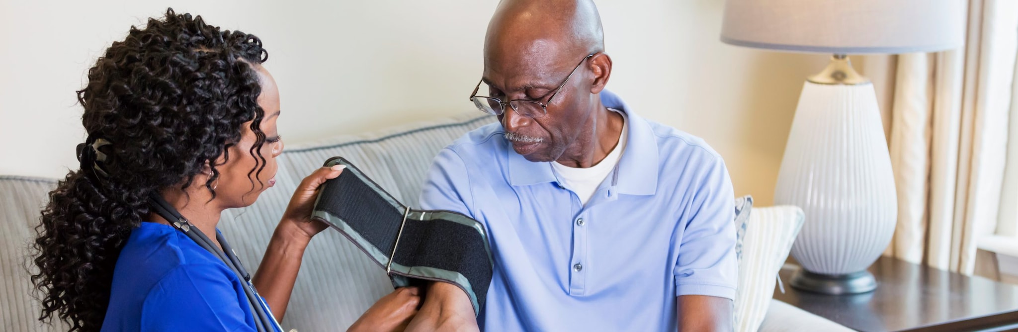 Older man having his blood pressure checked.