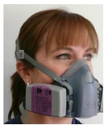 photo showing healthcare worker wearing an elastomeric respirator with title stating that most healthcare workers show high confidence in PPE protection during the pandemic