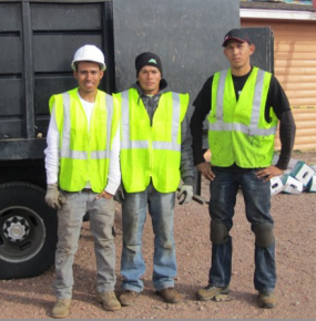 American Indian and Alaska Native workers pose for photo on construction site. Photo by NIOSH