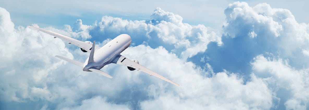 Commercial passenger airplane in flight with blue sky and clouds. Aircrew/flight crew concept