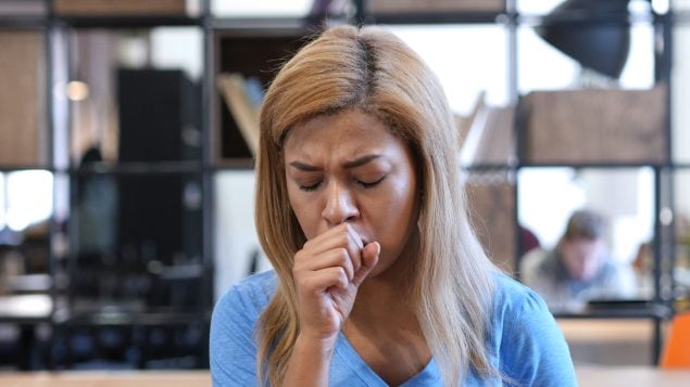 Woman Suffering From Cough