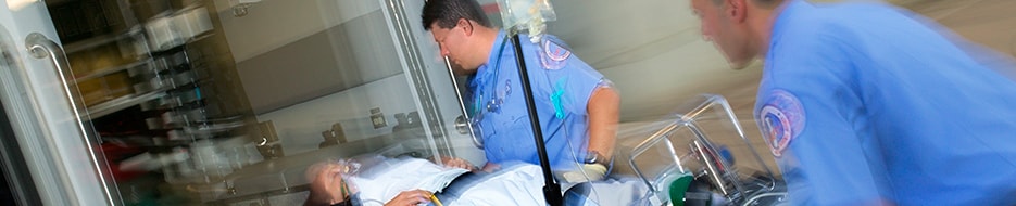ambulance workers with patient