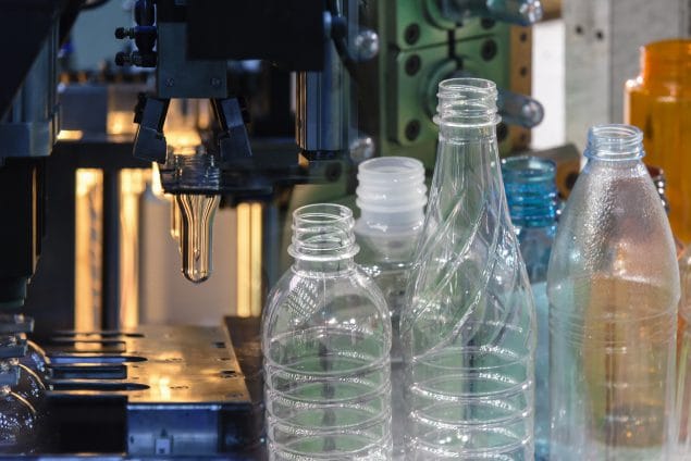 Plastic bottles in a manufacturing setting.