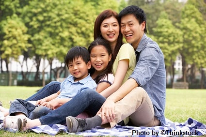 Asian family with their two children