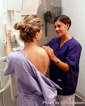 M3C1 woman getting mammogram