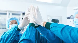 Surgical team high-five