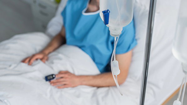 Patient In Bed with IV connected