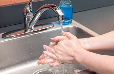 Wash your hands with soap and water or use hand sanitizer with at least 60% alcohol.