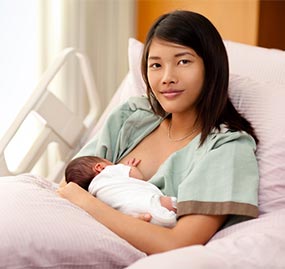 mom breastfeeding baby