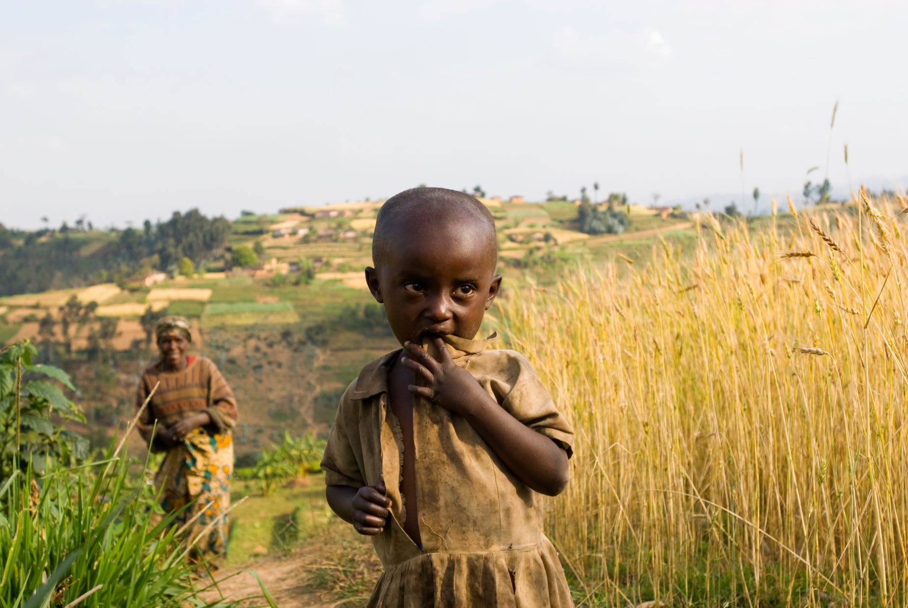 Rwanda woman child in field