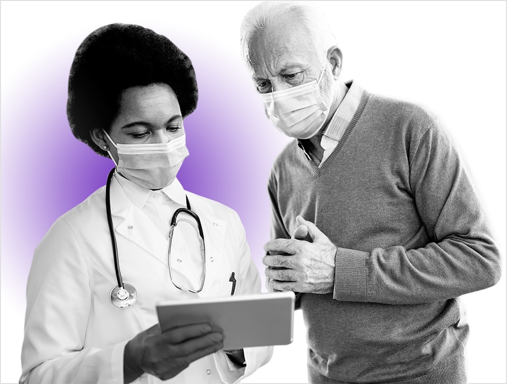 Doctor And Patient Using Tablet