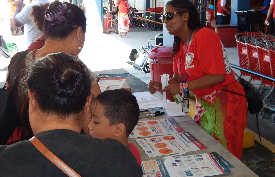 On a Zika Action Day in American Samoa, community members learn proper dress to prevent mosquito bites