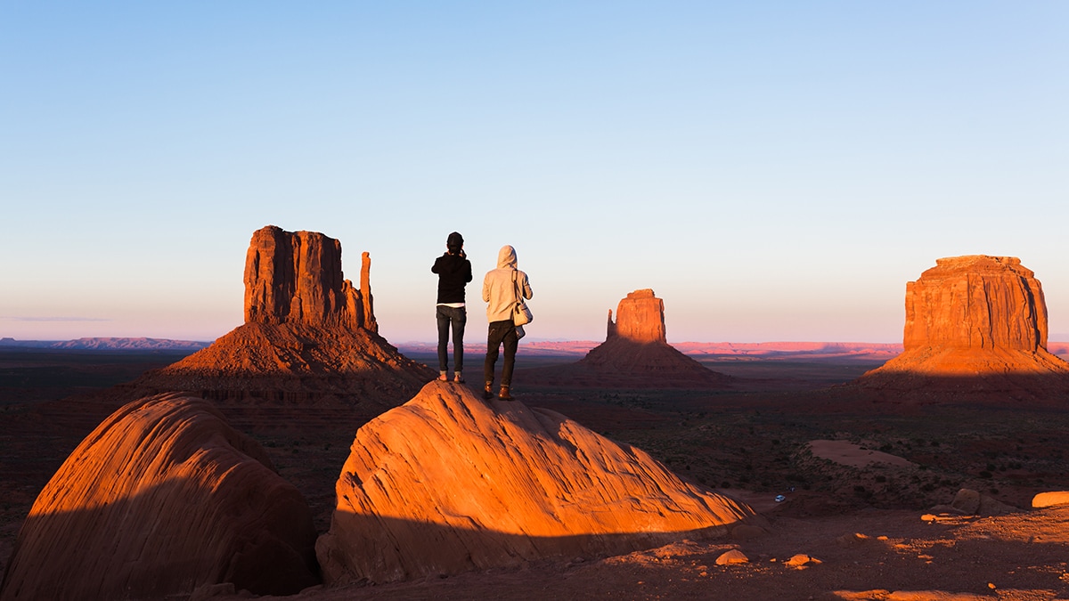 Two people standing in the dessert in Arizona. Photo credit: gettyimages