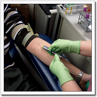 Image of a patient having their blood collected. Testing blood samples is a diagnostic technique used to identify Acute Chagas in infected individuals.