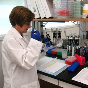 A CDC microbiologist using immunological tests to diagnose parasitic infections