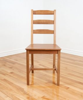 Empty chair in corner
