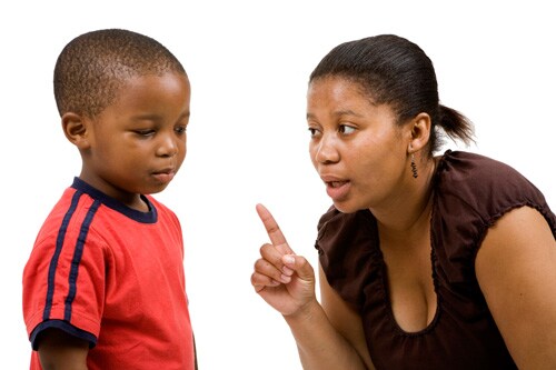 Mom disciplining her son