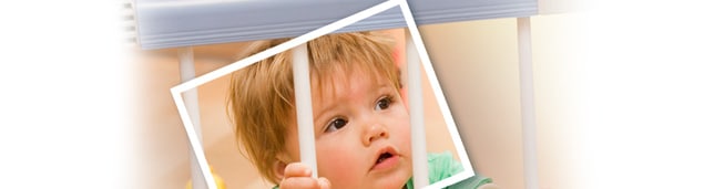 Graphic of toddler standing outside of a safety gate.