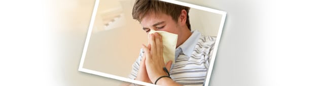 Graphic showing a teen-aged boy blowing his nose.