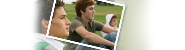 Graphic of two teen-aged boys sitting on the sidewalk.