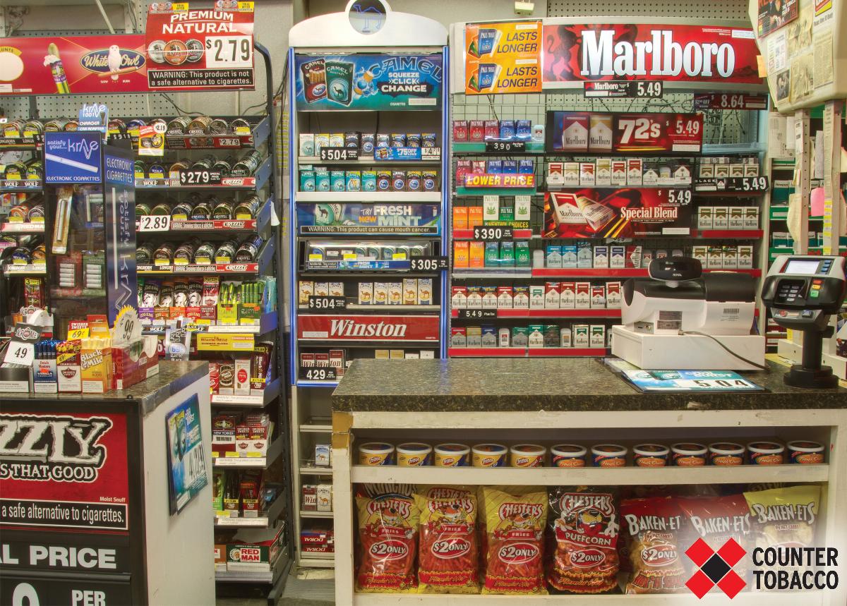 Customer view of tobacco advertising in a typical US convenience store (before).