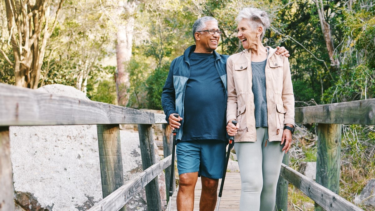 Older couple walking outdoors