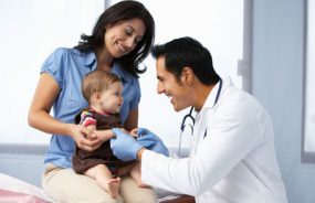 doctor treating baby