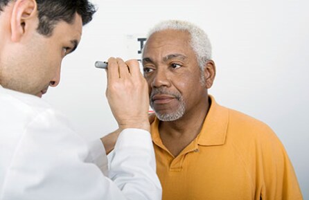 man taking an eye exam