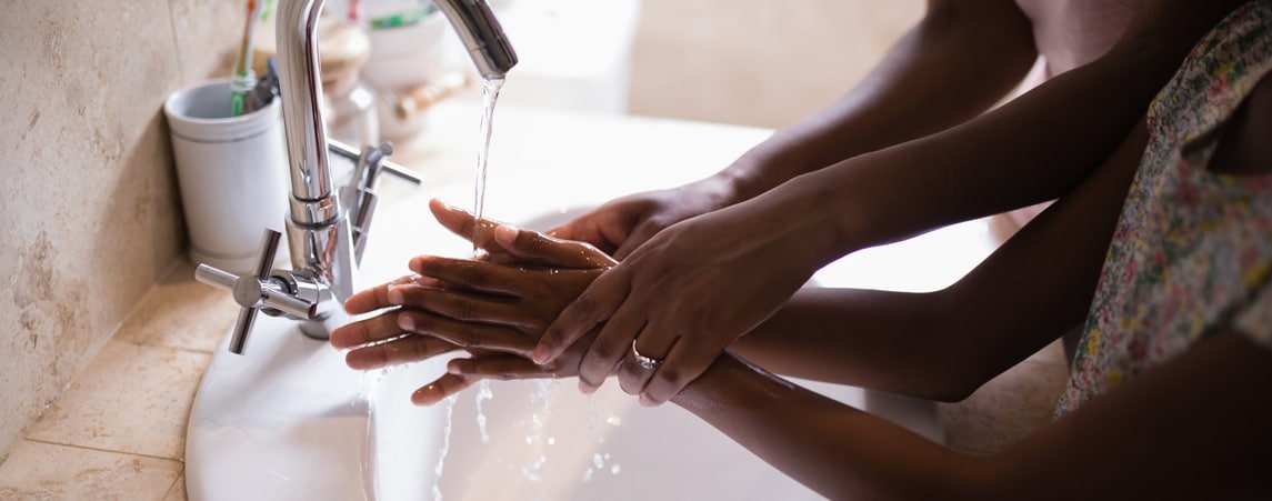 lead by example image mother child wash hands