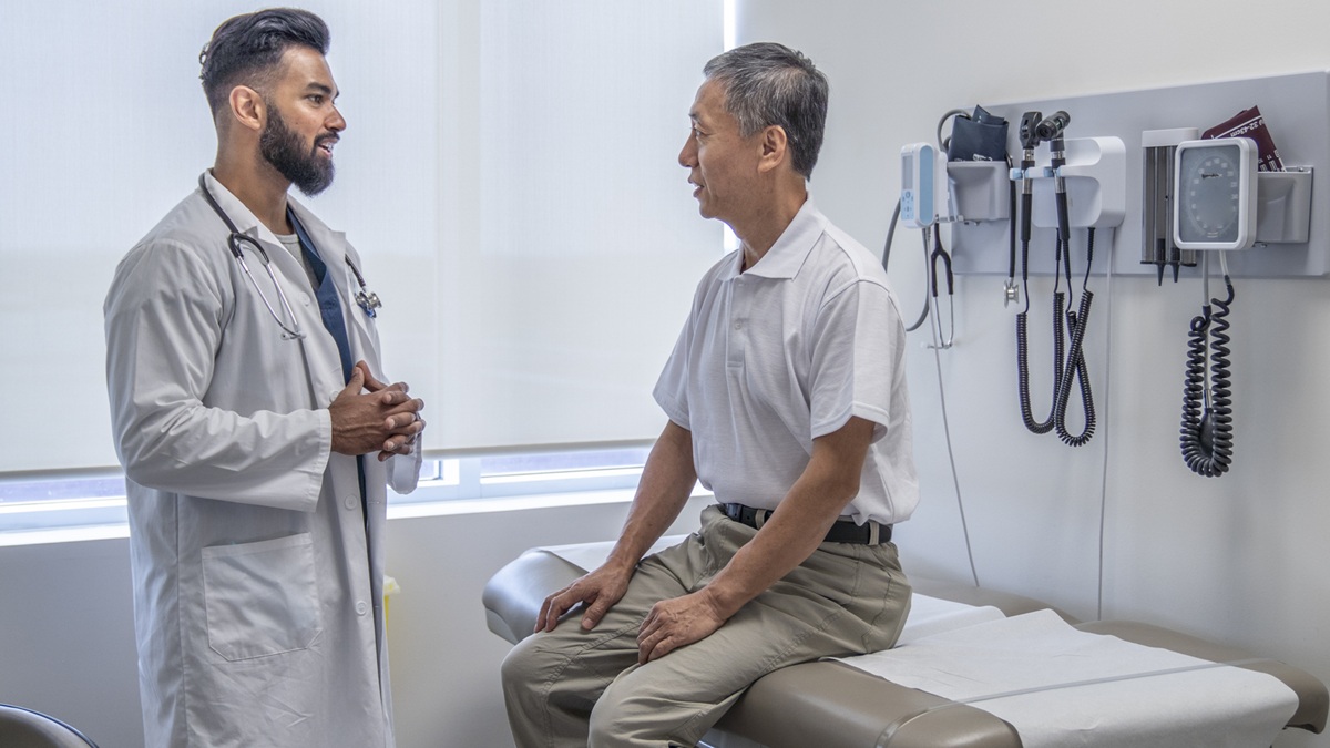 A man talking to his doctor