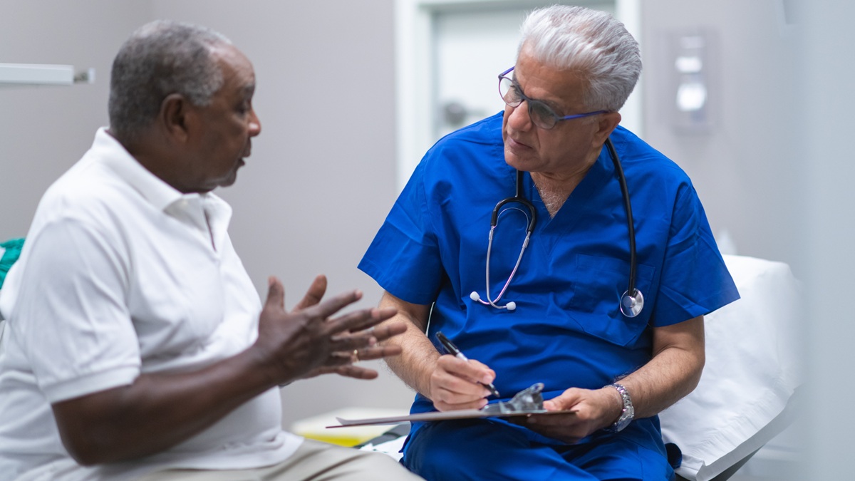 A man talking to his doctor