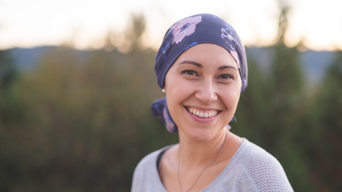 Woman wearing scarp smiling