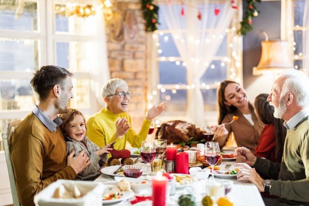 Multigenerational family enjoys festive holiday dinner