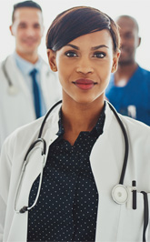 woman-doctor2 Close up of a group of doctors with a woman doctor in the front