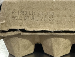 P-code and sell by dates on the side of recalled shell egg cartons.
