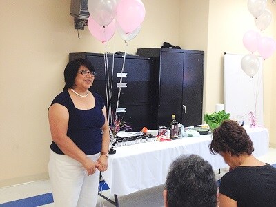 Photo of Ms. Maria Barrera making a presentation.