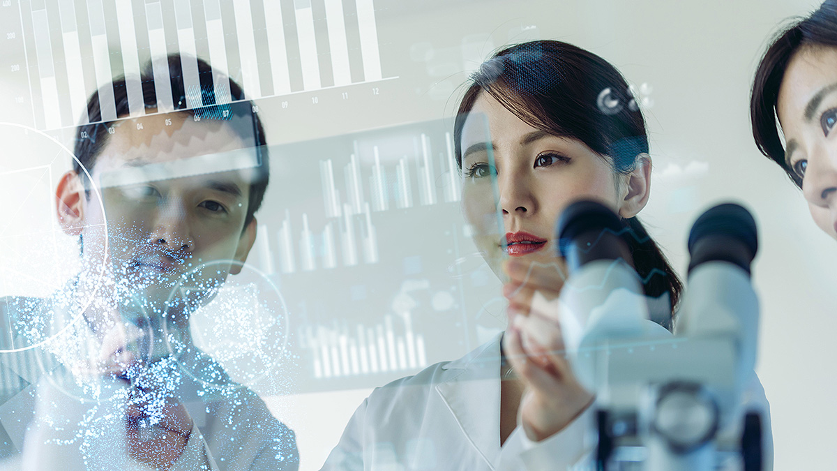 Three epidemiologists in front of a microscope with data charts and graphs superimposed over the image.