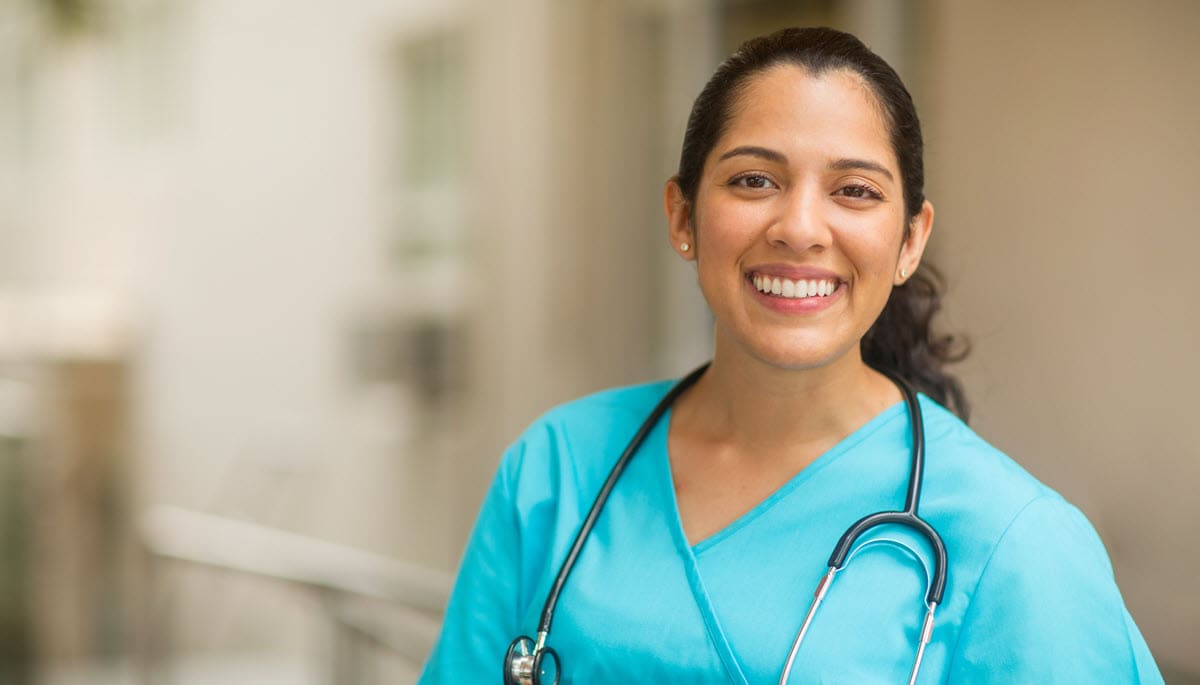 A smiling female health care worker