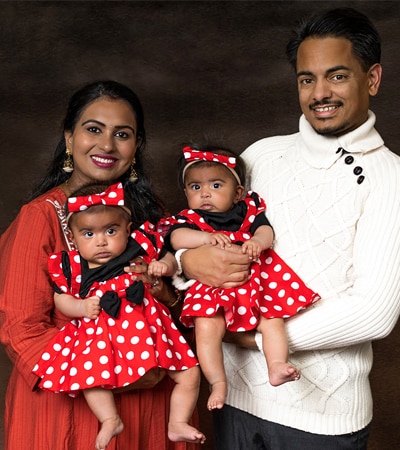 Navdeep Singh, his wife, and two daughters.