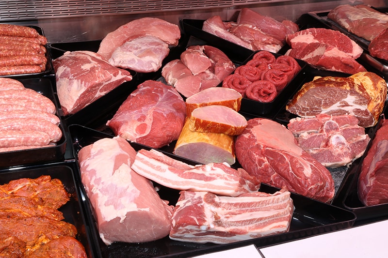 Tray with multiple cuts of mammalian meat