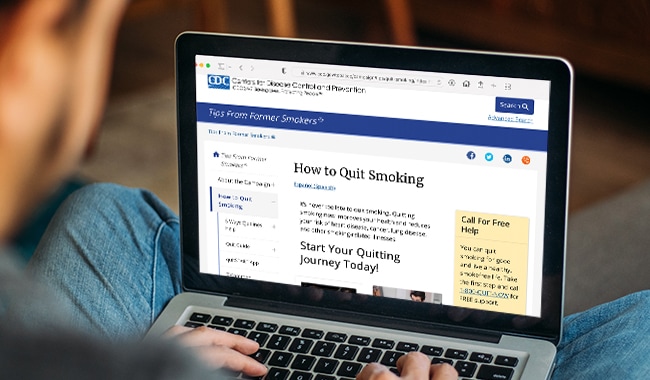laptop with the words How to Quit Smoking