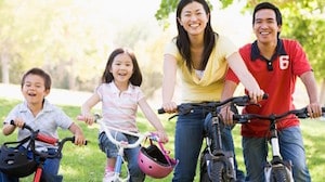 Asian American family on bikes