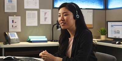 Woman in call center with headset