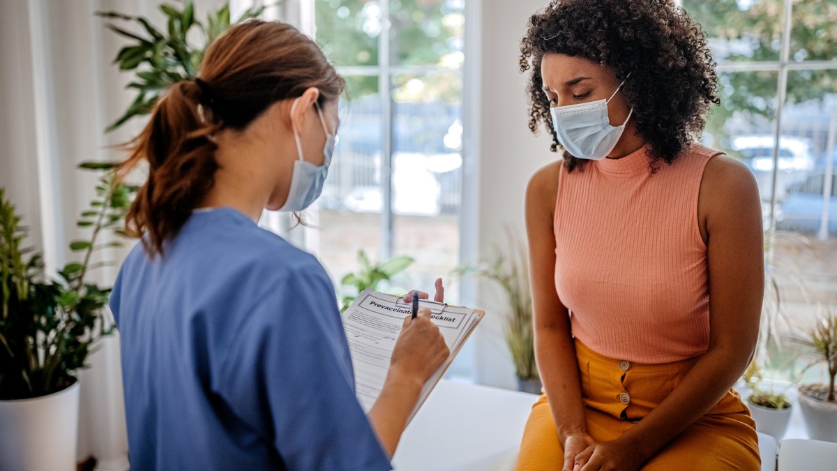 a woman talking to her doctor