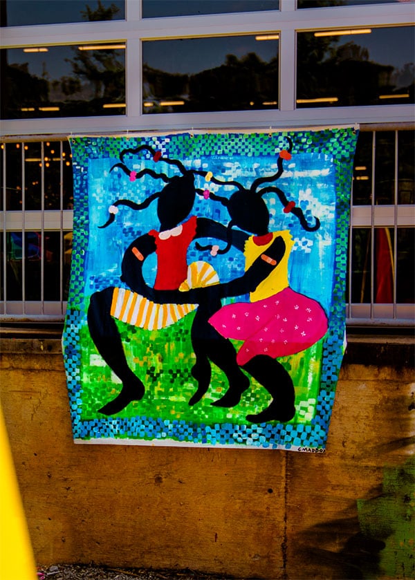 Photo of a colorful hanging quilt