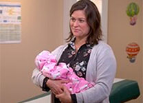 hcp-edu-cme-presentations-02 Mother holding baby