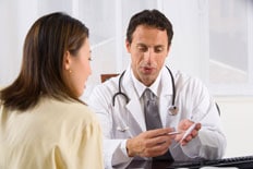 Doctor consulting patient
